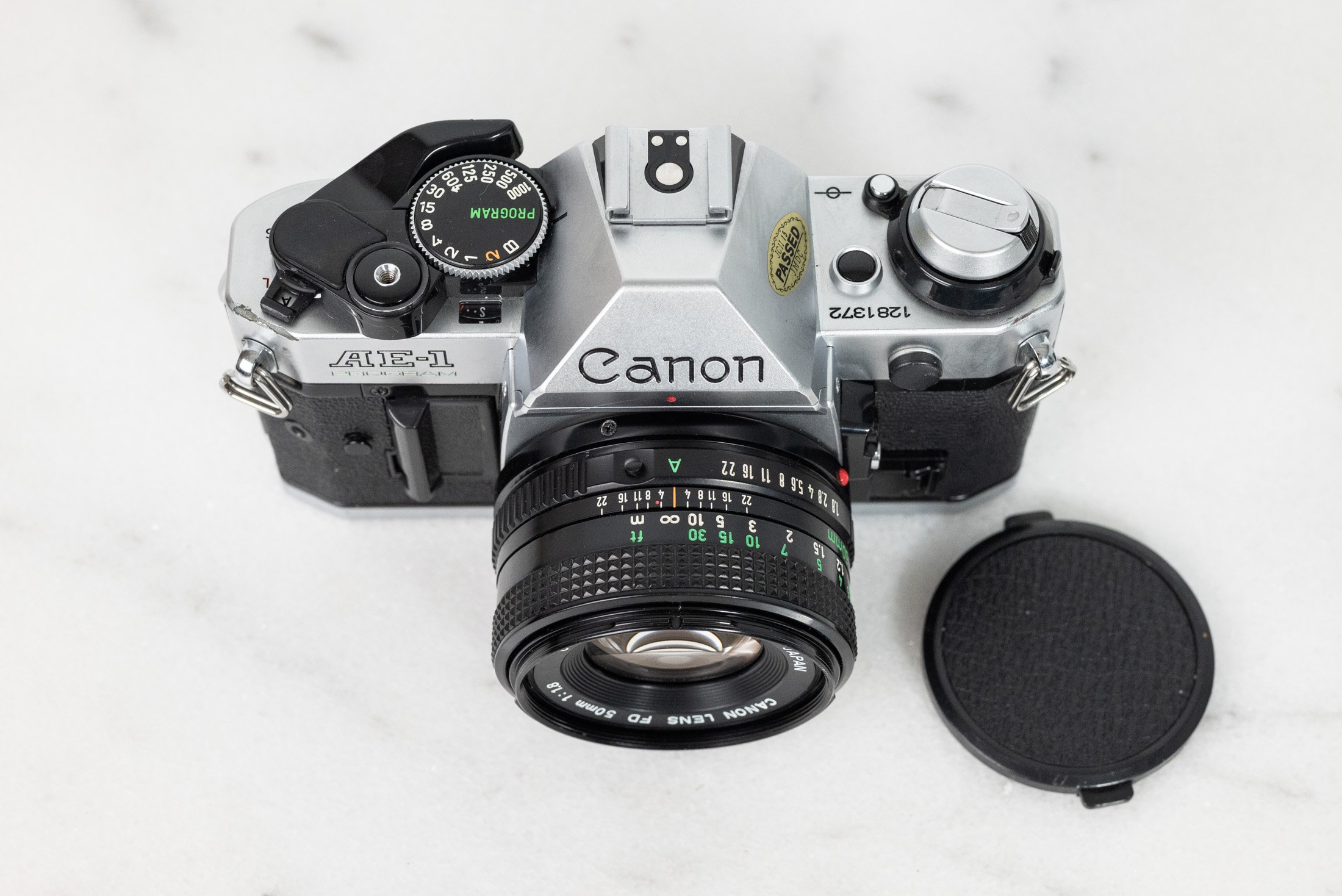 Canon AE-1 Program 35mm Film SLR Camera with Canon FD 50mm F/1.8